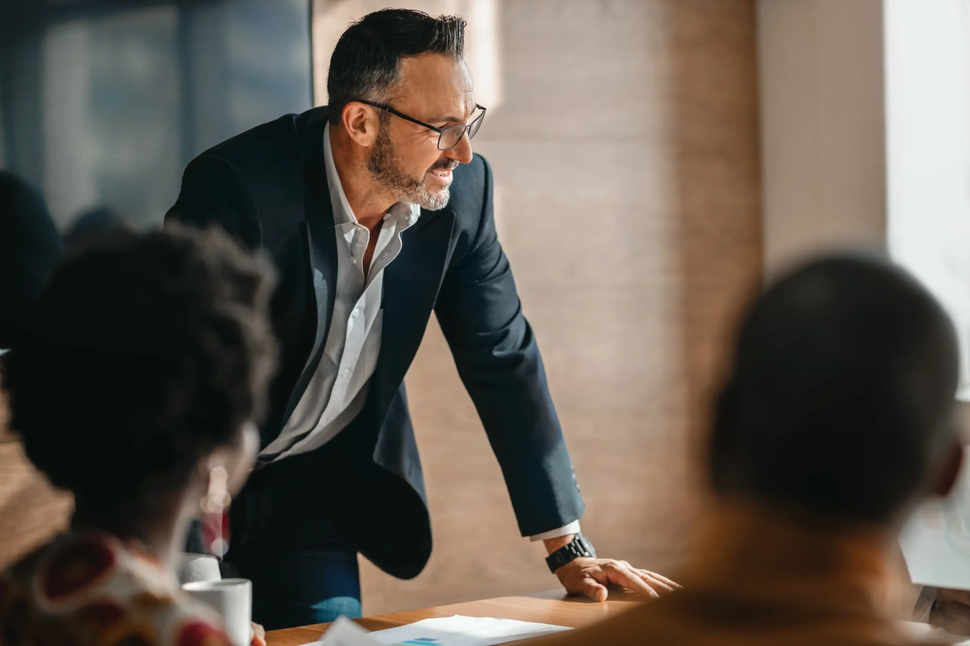AdobeStock_333408204 business leader analyzing strategy and governance risk management planning in office